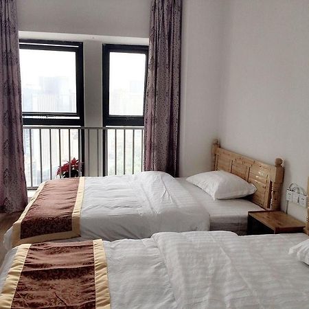 צ'נגדו Neighbor Home Apartment Hotel מראה חיצוני תמונה